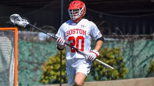 Will Carson playing lacrosse