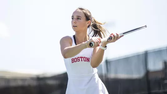 Erica Di Battista goes for a volley at the net