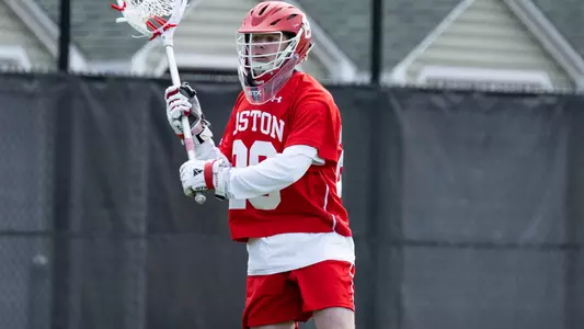 Will Barnes playing lacrosse