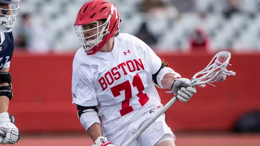 Matt Baugher playing lacrosse