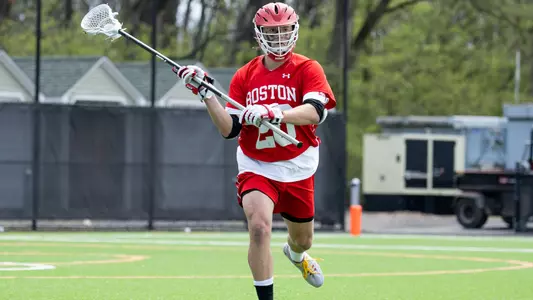 Will Carson playing lacrosse