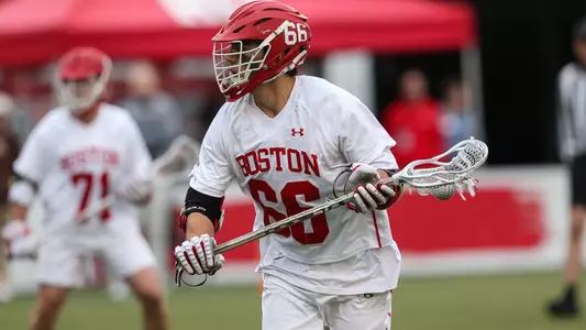 James Corcoran playing lacrosse