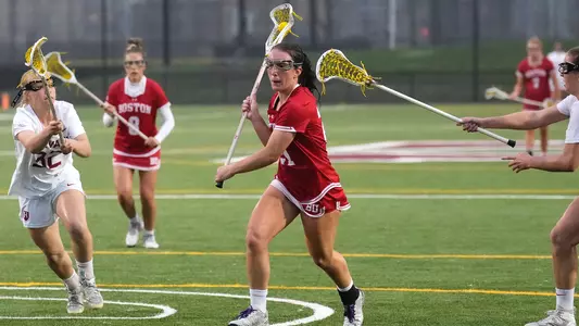 Jennifer Barry races towards the net in a game at Harvard.