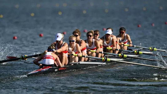 Women's Rowing Varsity Eight Boat races down the course from the start line at 2022 NCAA Championships