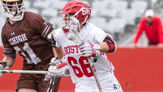 James Corcoran playing lacrosse