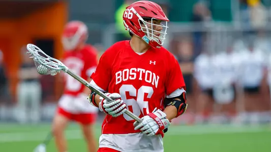 James Corcoran playing lacrosse