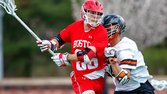 James Corcoran playing lacrosse