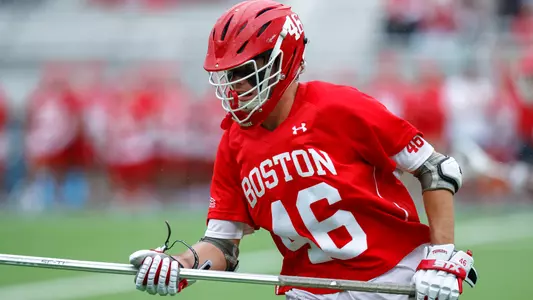 Dane DeGoler playing lacrosse