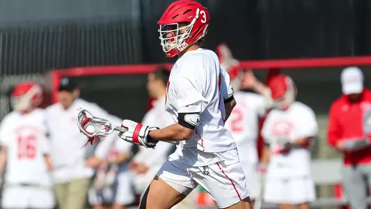 Jett Dziama playing lacrosse