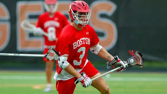 Jett Dziama playing lacrosse