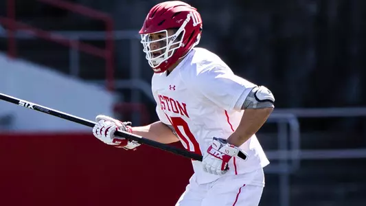 Colby Kim playing lacrosse