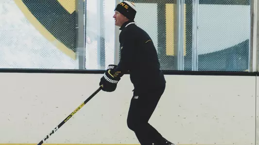 Kim Brandvold skating at a Bruins practice