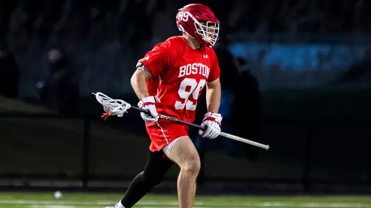 Jonathan Spiropoulos playing lacrosse
