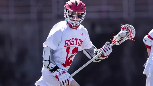 Zach Travaglini playing lacrosse