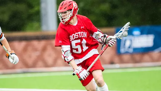 Tommy Bourque playing lacrosse