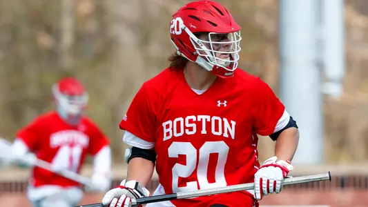 Will Carson playing lacrosse