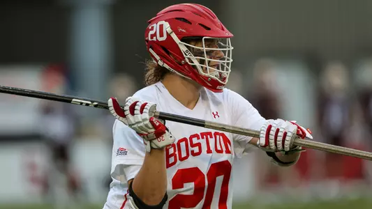 Will Carson playing lacrosse