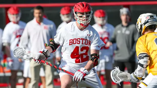 Jake Cates playing lacrosse