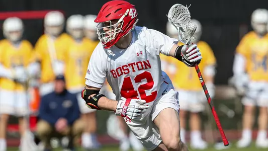 Jake Cates playing lacrosse