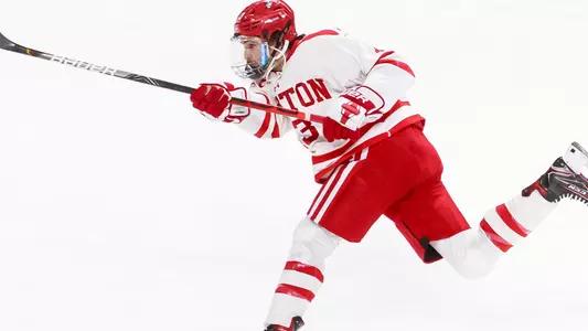 Dylan Peterson shooting a puck