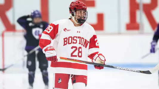 Catherine Foulem smiling on the ice before the opening faceoff