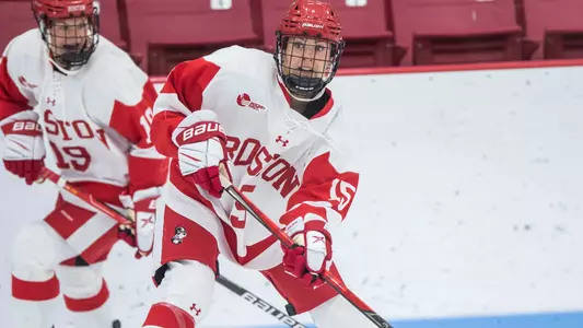 Ellie Larson playing hockey