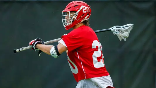 Will Carson playing lacrosse