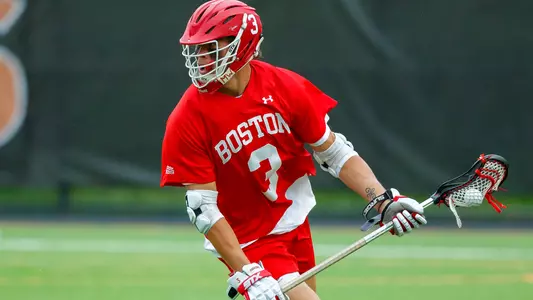 Jett Dziama playing lacrosse