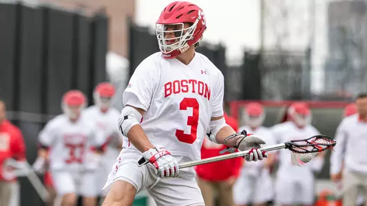 Jett Dziama playing lacrosse