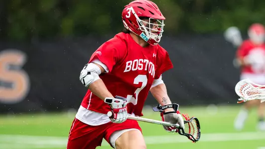 Jett Dziama playing lacrosse