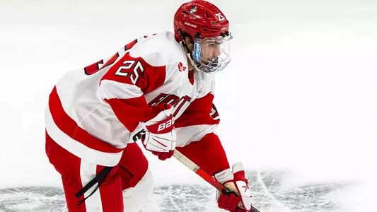 Sam Stevens playing hockey