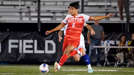 Diego Rived pushes his leg back for a hard kick on the soccer ball at Albany.
