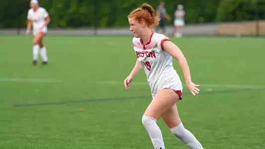 Photo of women's soccer freshman Margy Porta dribbling the ball.