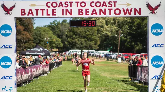 Aksel Laudon crossing finish line at Battle in Beantown