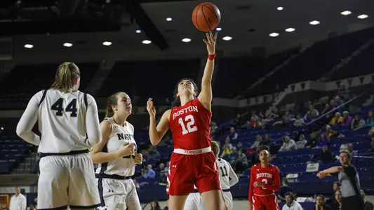 Photo of women's basketball senior Annabelle Larnard playing against Navy.