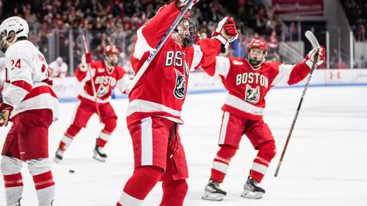 Lane Hutson celebrates his game-winning goal against Cornell