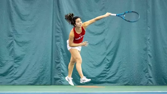 Katlin Tan Serves at Syracuse