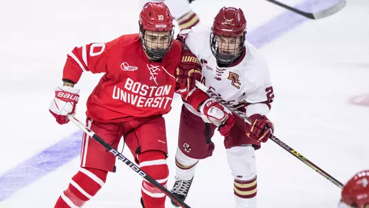 Nick Zabaneh skating next to a BC player