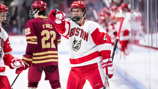 Ty Gallagher pointing to a teammate as he celebrates one of his goals against BC
