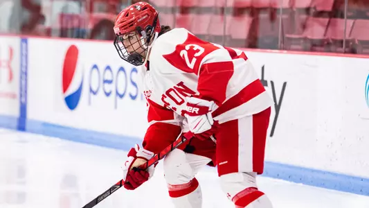 Junior defender Tamara Giaquinto controls the puck vs. PC