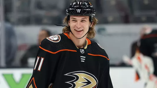 Trevor Zegras smiling while playing for the Anaheim Ducks