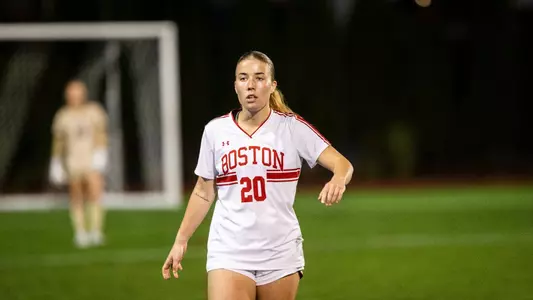 Photo of women's soccer sophomore Natalie Godoy surveying the field.