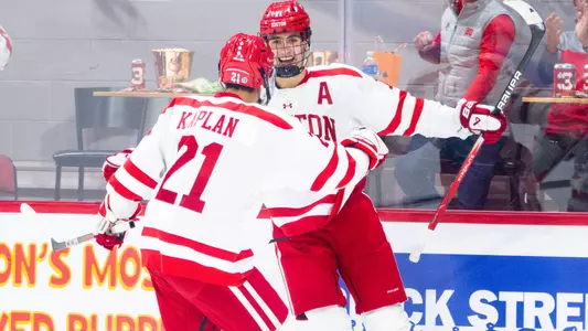 Luke Tuch celebrates a goal with Devin Kaplan