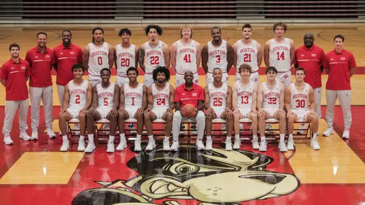 2023-24 BU men's basketball team photo with front row sitting in chairs and second row standing