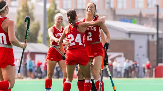 Payton Anderson celebrates a goal with Thalia Steenssens