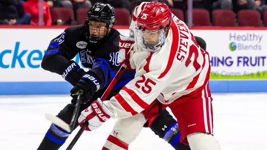 Sam Stevens shooting the puck against Bentley