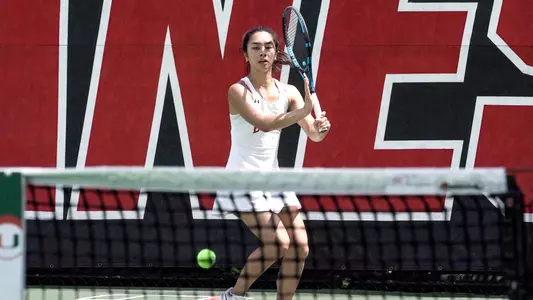 Kaitlin Tan Setting up to hit a forehand