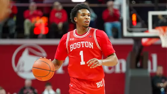Ethan Okwuosa handles the ball against Rutgers