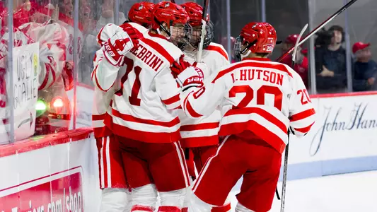 BU men's ice hockey players celebrating a goal