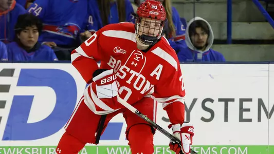 Lane Hutson playing hockey